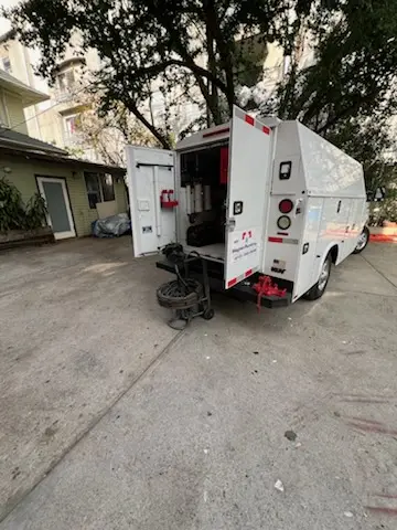 Magnet Plumbing service vehicle on-site for Grease Trap Cleaning in Champions Point